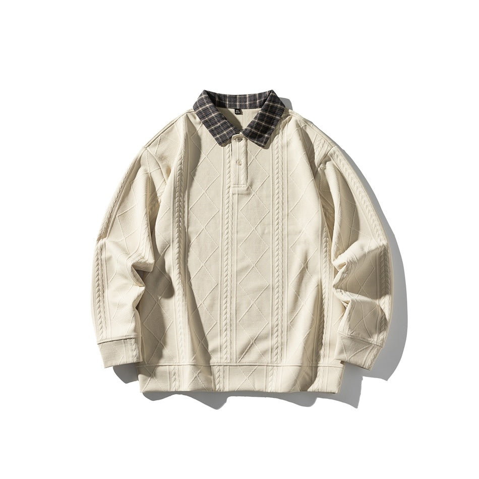 Off-white textured long-sleeve pullover with dark plaid polo collar and two-button placket, flat lay front view