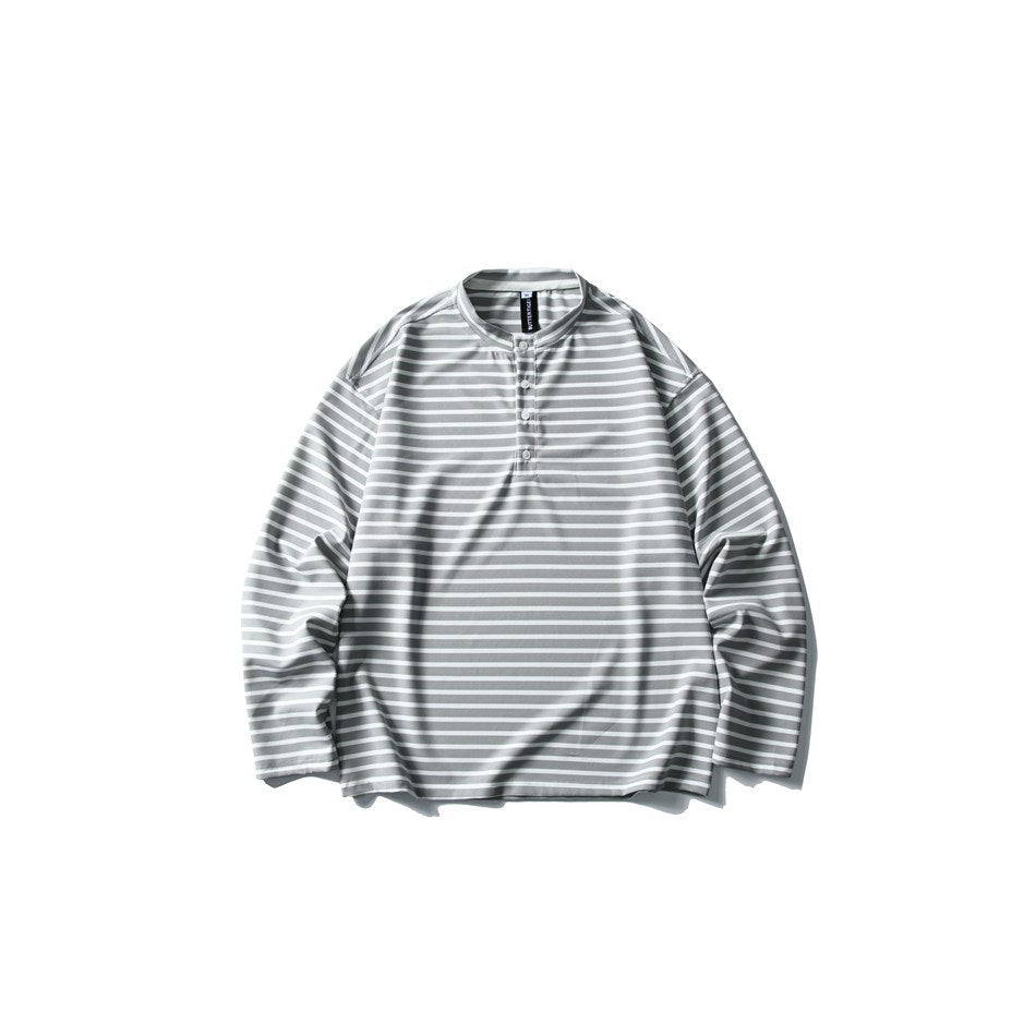 Light gray and white striped long-sleeve top with stand collar and button placket, flat lay front view
