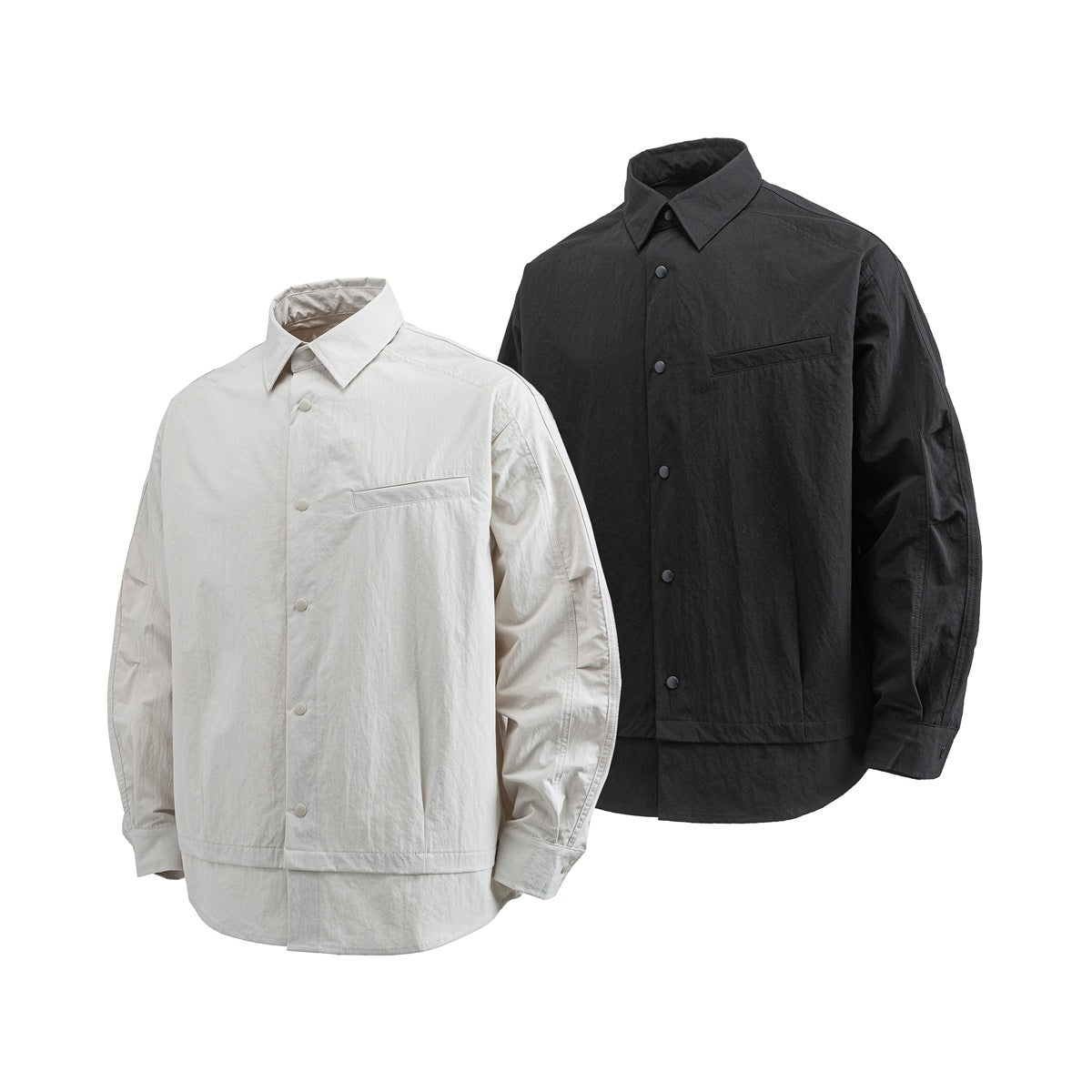 Light beige and black long-sleeve collared overshirts shown from the front, each with a chest pocket and button closure.