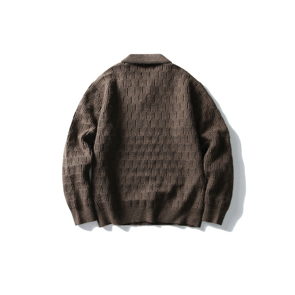 Back view of a brown collared knit sweater with a raised rectangular stitch pattern.