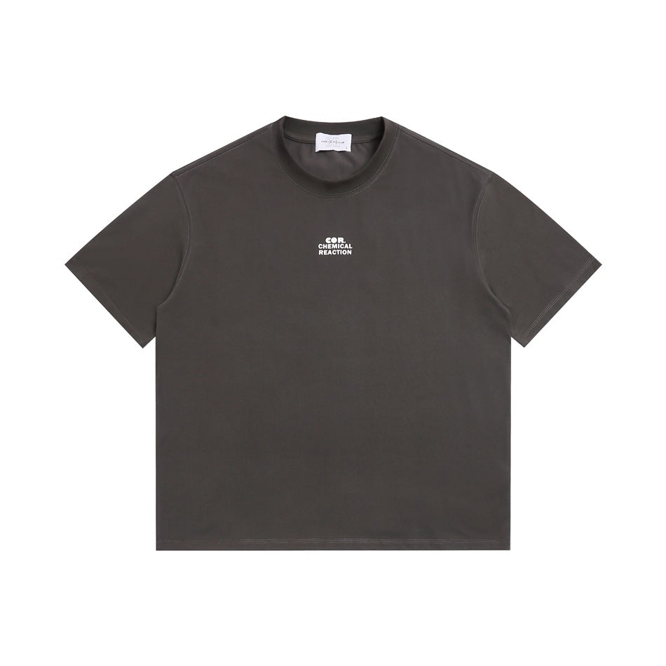 Gray short-sleeve crew-neck t-shirt flat lay with a small white chest print, neck label and visible stitching