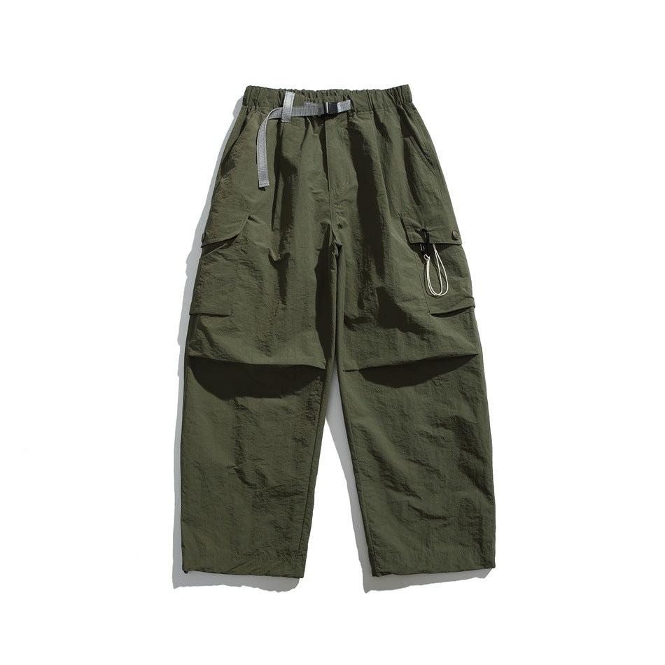 Army green wide-leg cargo pants with gray buckle belt and flap side pockets, flat lay front view