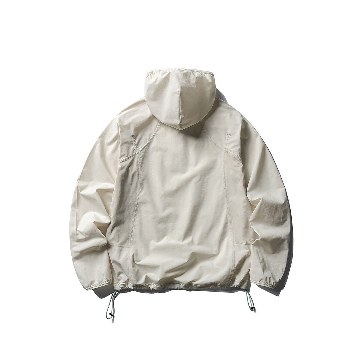 Back view of an ivory hooded pullover jacket with curved seams, elastic cuffs and hem, and adjustable drawcords.