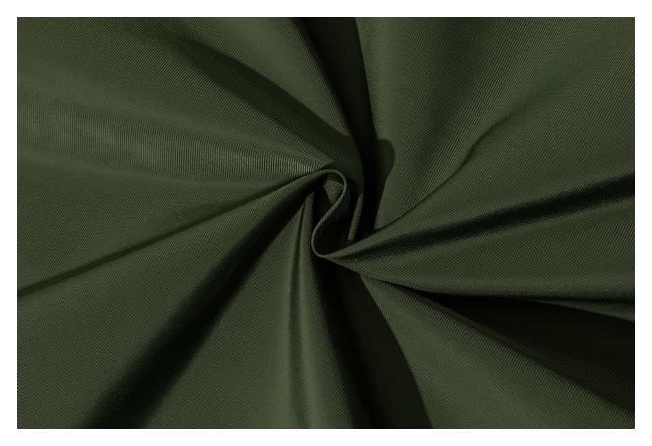 Close-up of dark olive fabric gathered into a spiral, showing its fine ribbed texture.