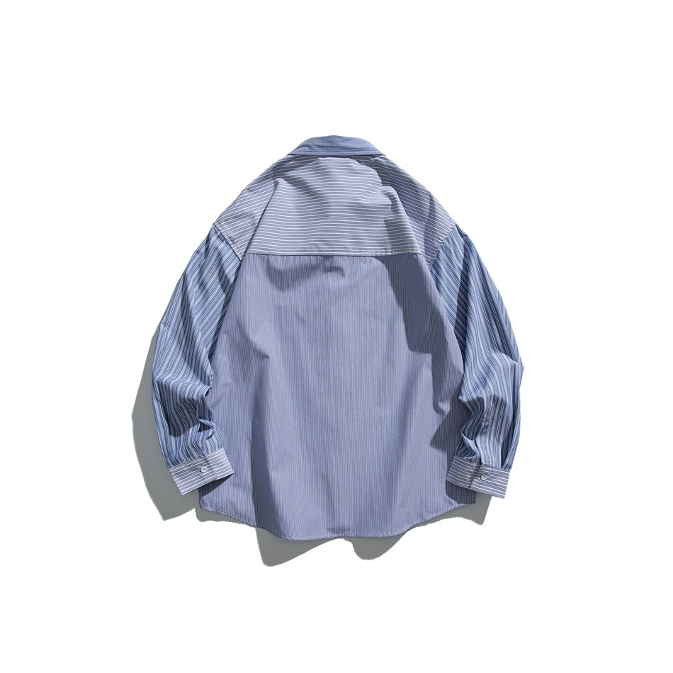 Back view of a blue shirt with a solid center panel and striped yoke and sleeves.