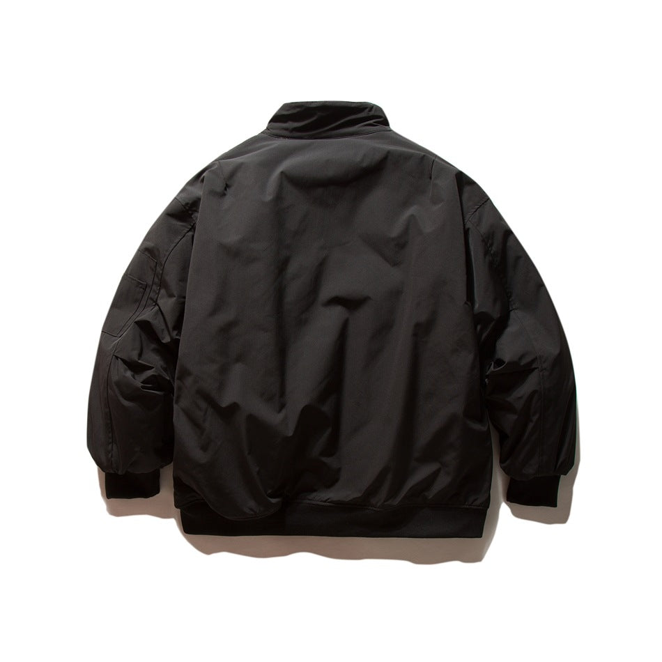 Back view of a black jacket with a stand collar, gathered sleeves, ribbed cuffs, and hem.