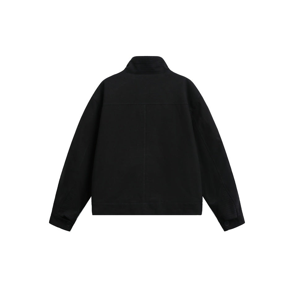 Back view of a black jacket with a stand collar, center seam, long sleeves, and buttoned cuffs.