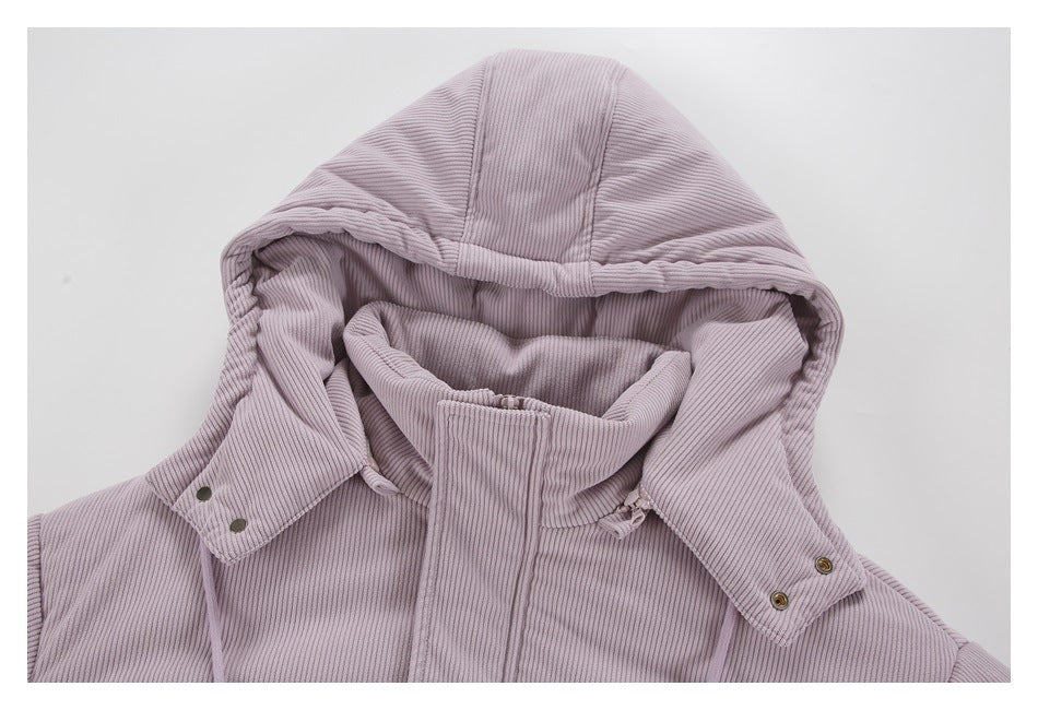 Close-up of a lilac ribbed jacket's hood, high collar, and snap-fastened hood tabs.