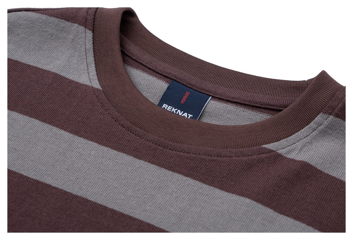 Close-up of the burgundy ribbed crew neckline and sewn-in neck label on the striped T-shirt.