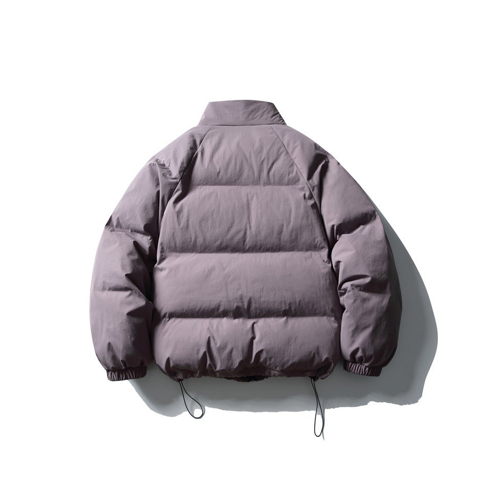Back view of a mauve-gray padded jacket with horizontal quilting, a high collar, and adjustable hem cords.