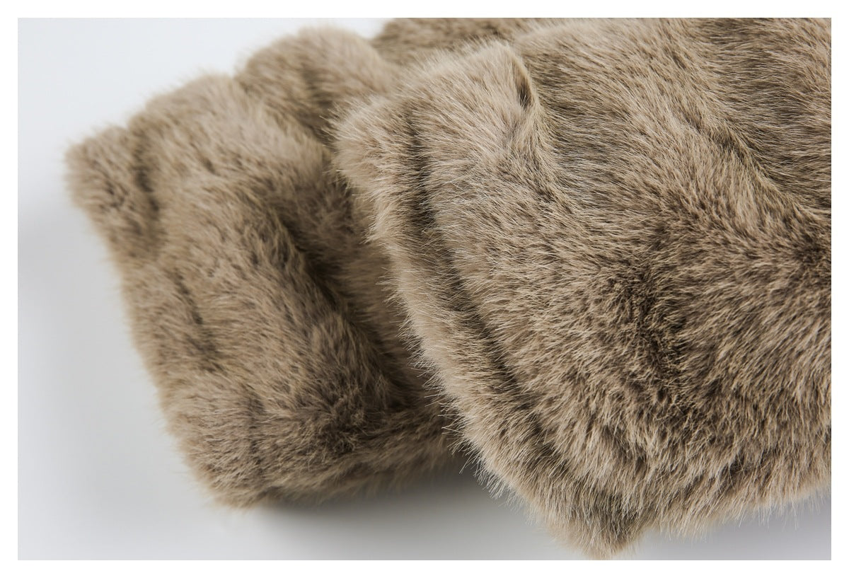 Close-up of layered brown faux-fur edges with a thick, rounded trim.