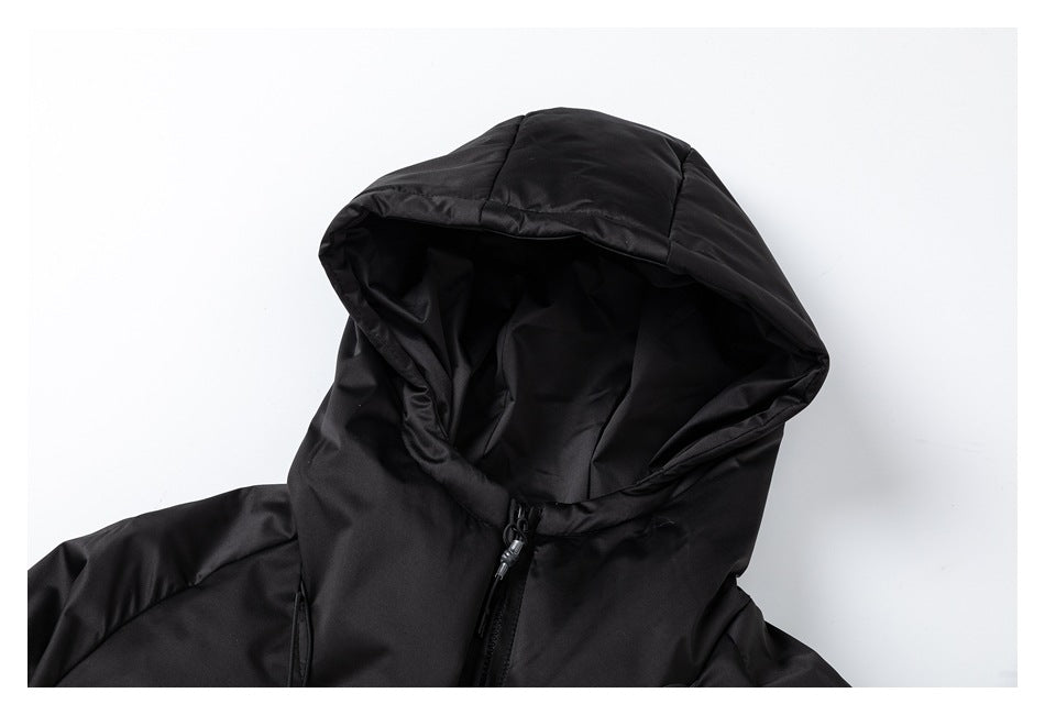 Close-up of the black jacket's raised hood, inner lining, and front zipper.
