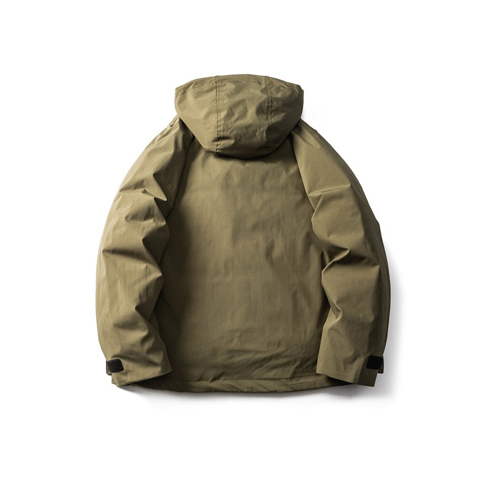 Back view of an olive-khaki hooded jacket with long sleeves and adjustable hook-and-loop cuffs.