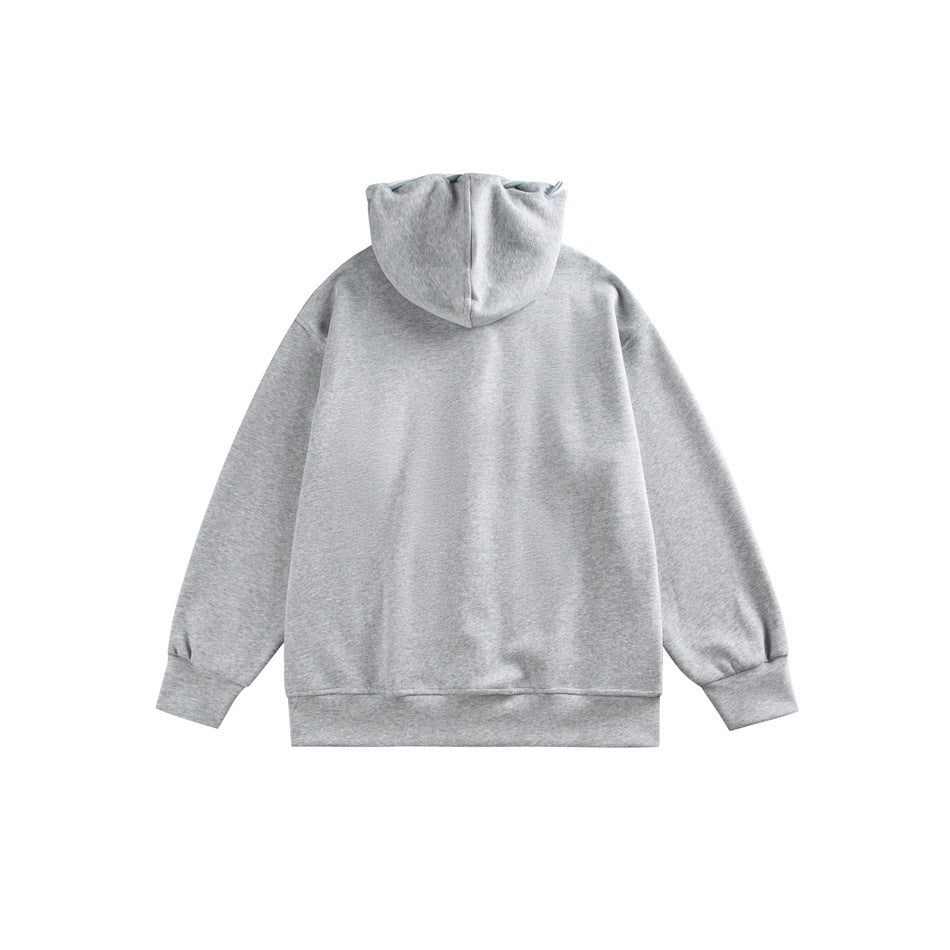Back view of a light gray hooded sweatshirt with cord loops along the hood.