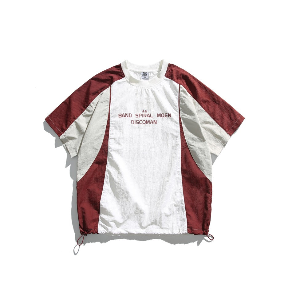 Brick red and white color-block short-sleeve tee with chest print and drawstring hem, flat lay front view