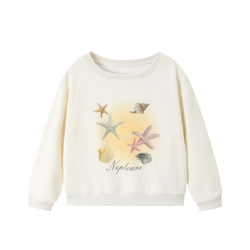 Off-white crewneck sweatshirt with a yellow gradient starfish and seashell print and script lettering on the front