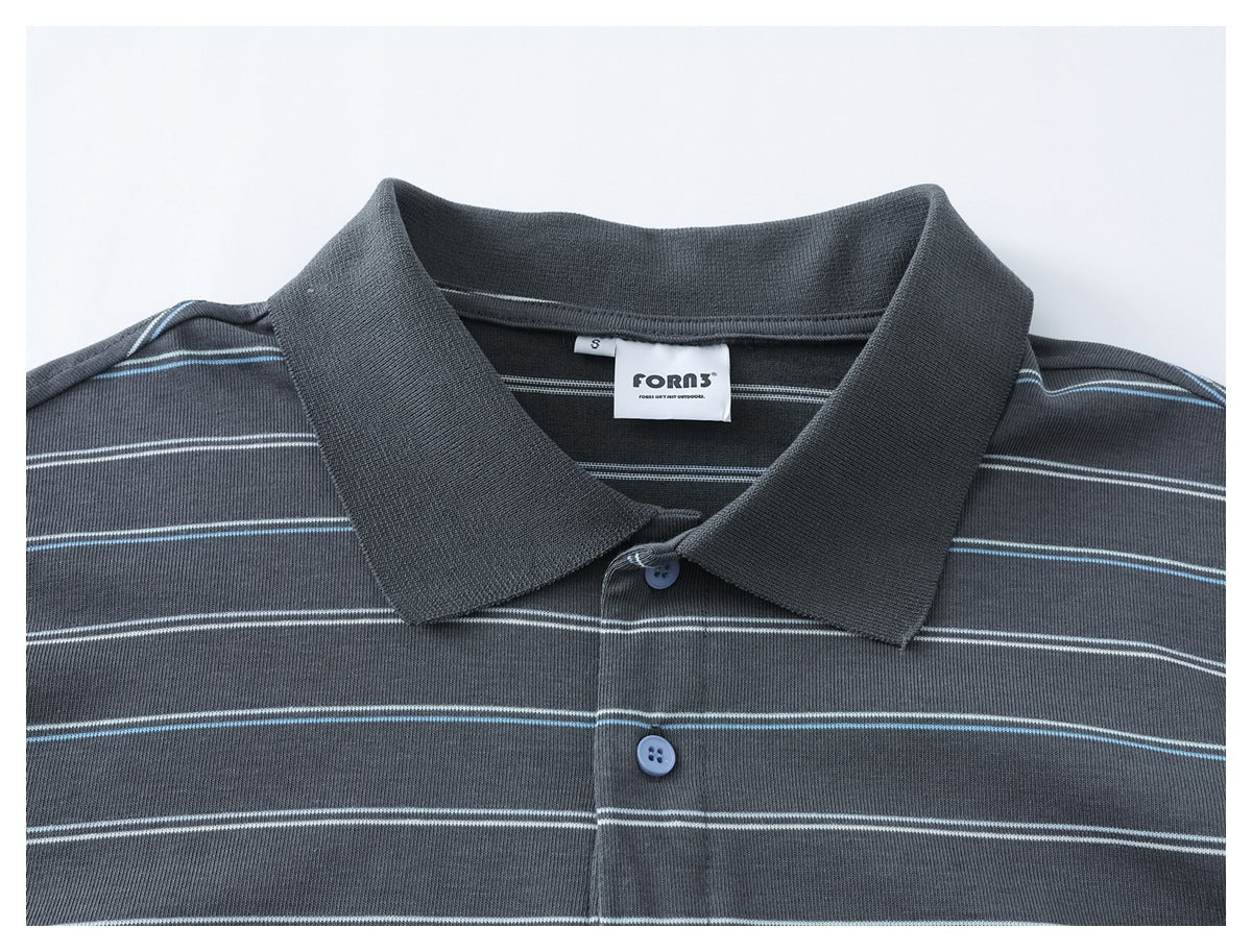 Close-up of the charcoal striped polo's collar, blue buttons, and neck label.