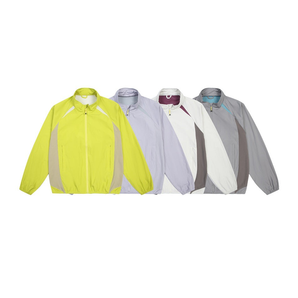 Four front-view zip jackets shown together in lime green, pale lavender, white, and gray.