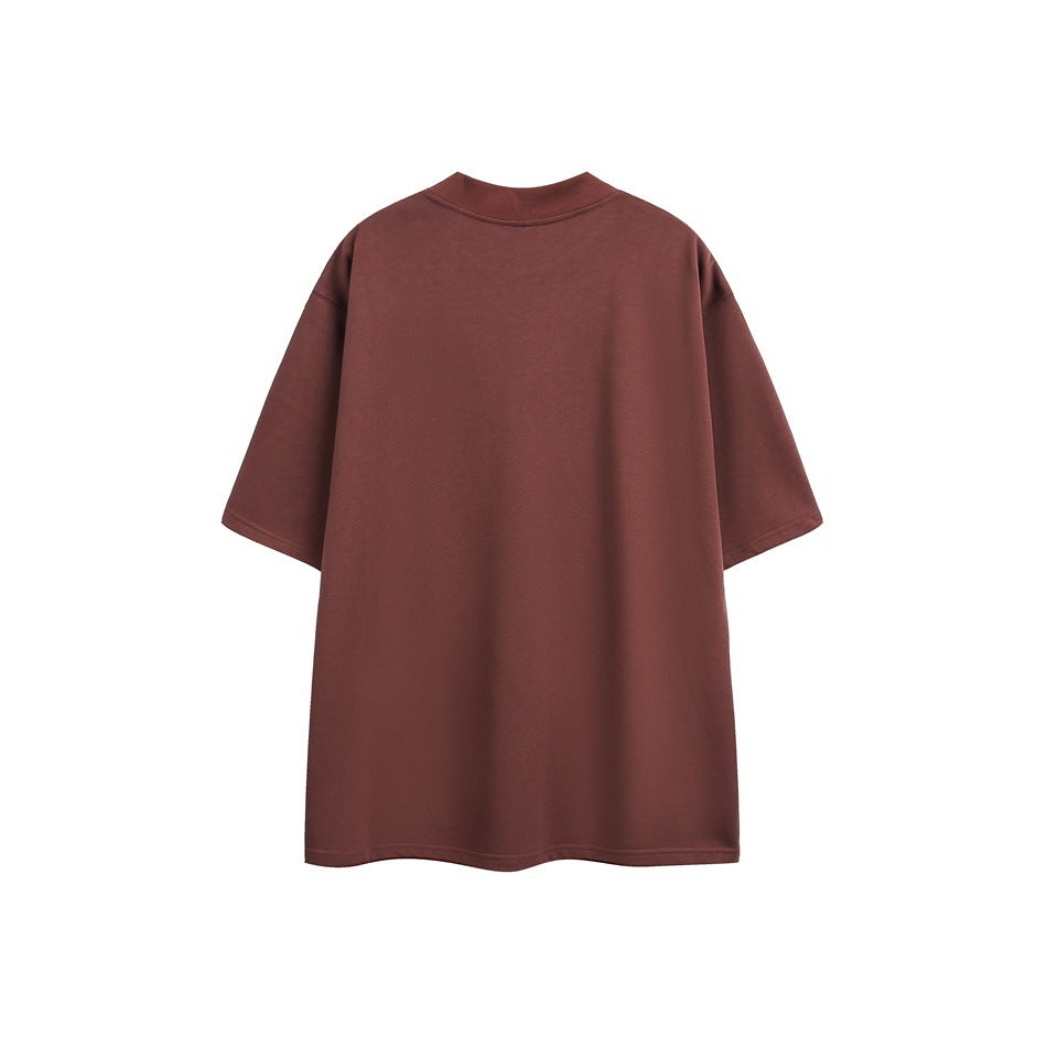 Back view of a plain burgundy oversized short-sleeve T-shirt on a white background.