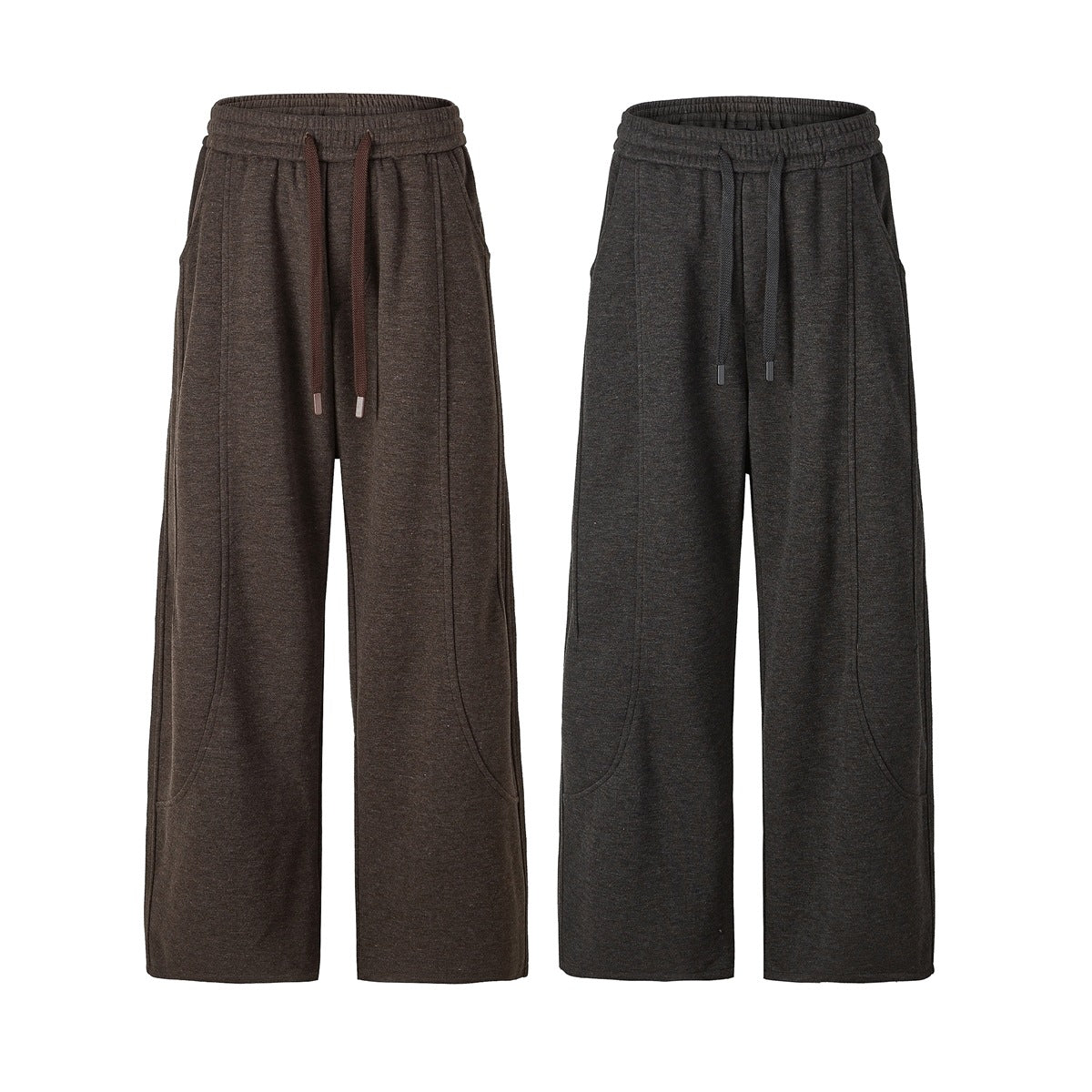 Front views of brown and charcoal wide-leg pants with elastic waistbands, drawstrings, and curved pockets.