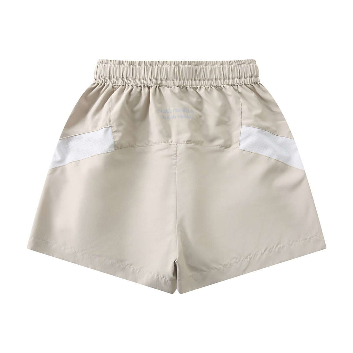 Back view of cream shorts with an elastic waistband and white dotted side panels.