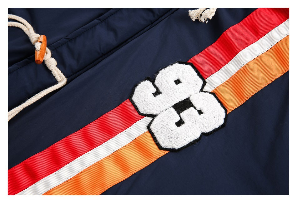 Close-up of the jacket's embroidered white 98 patch over red, white, and orange stripes.