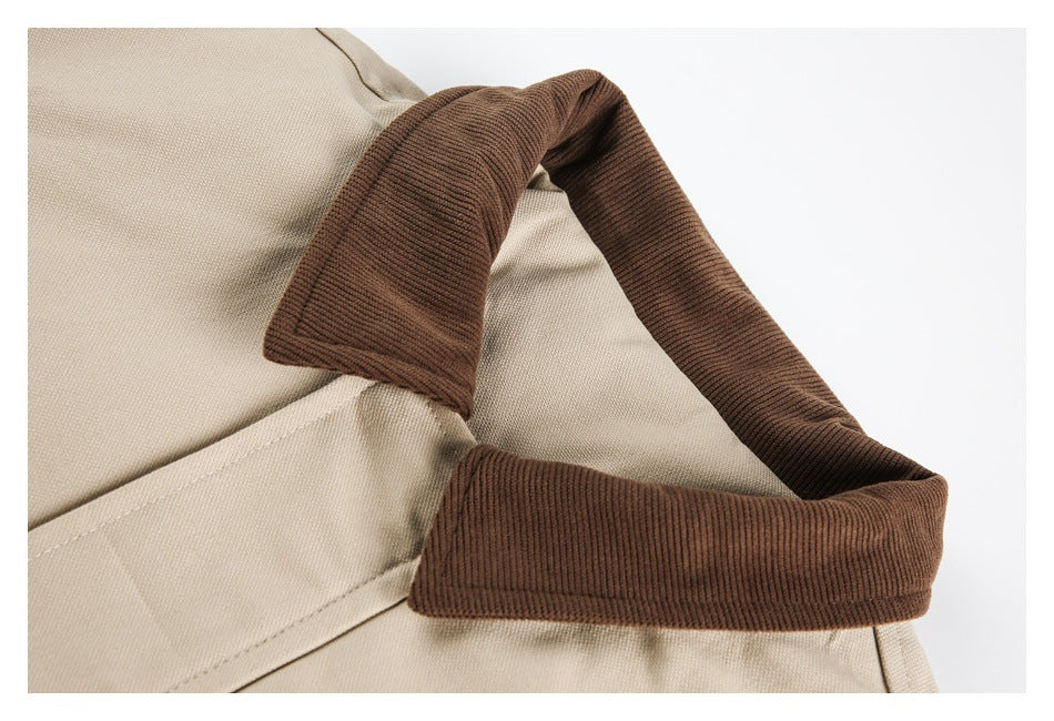 Close-up of a brown ribbed collar against beige garment fabric.