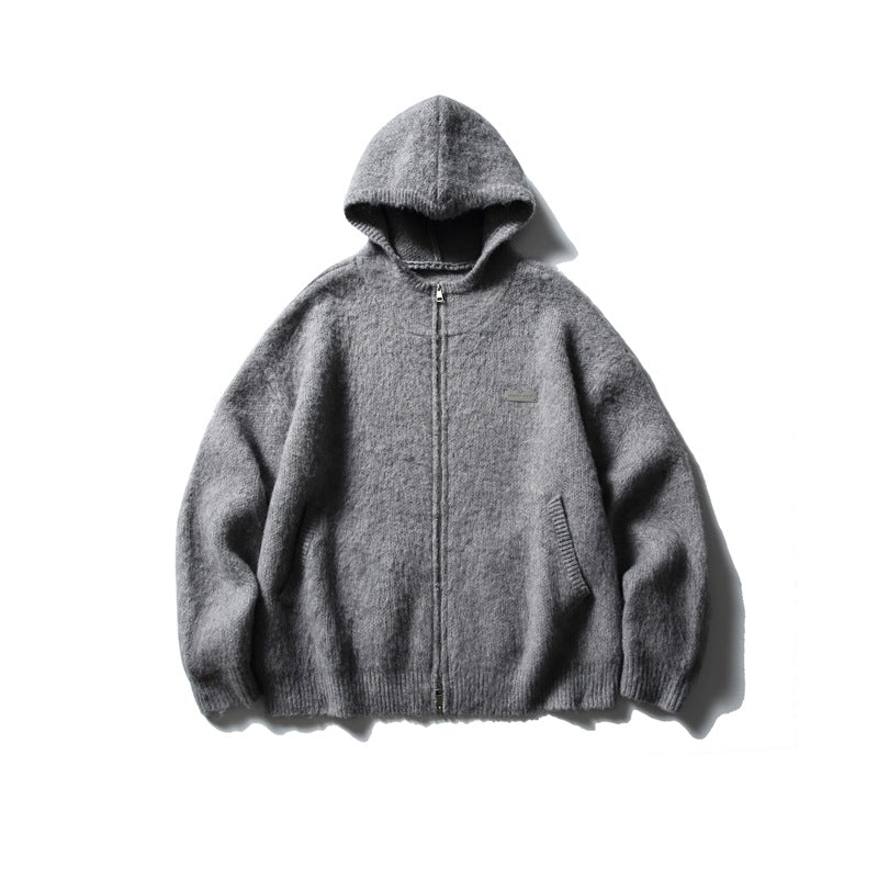 Gray hooded zip-front knit cardigan with fuzzy texture, ribbed cuffs and hem, and a small chest patch, flat lay