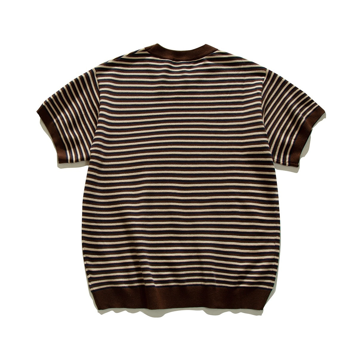 Back view of a short-sleeve knit top with fine cream, brown, and navy stripes and solid brown ribbed trim.