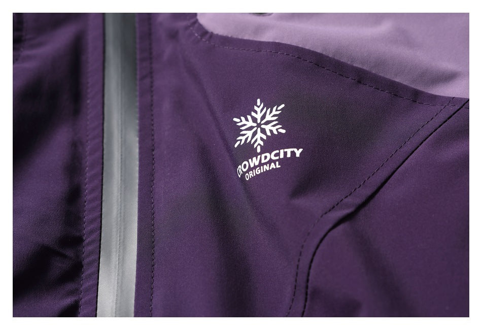 Close-up of a white snowflake and English lettering printed on the purple jacket.