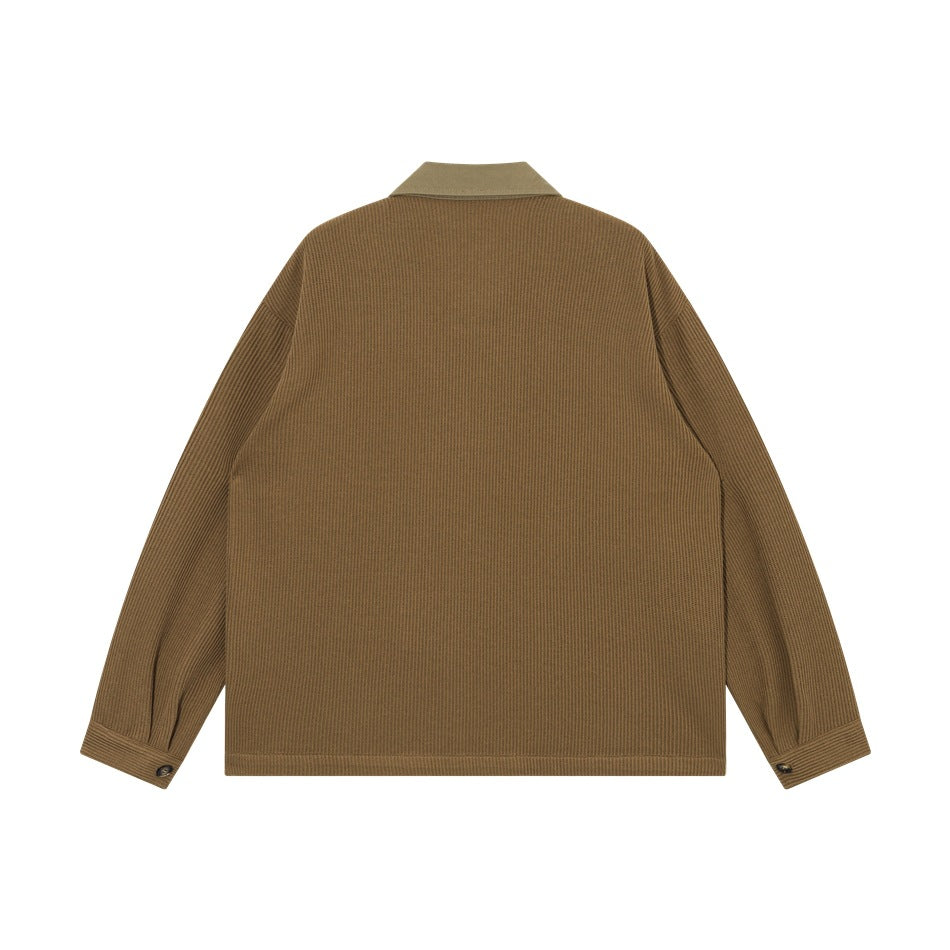 Back view of a brown collared jacket with long sleeves and buttoned cuffs.