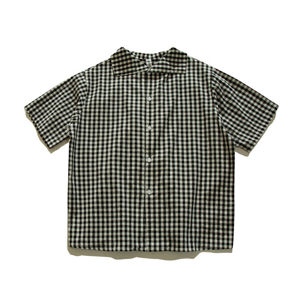 Black and white gingham check short-sleeve button-front shirt with wide collar, flat lay front view
