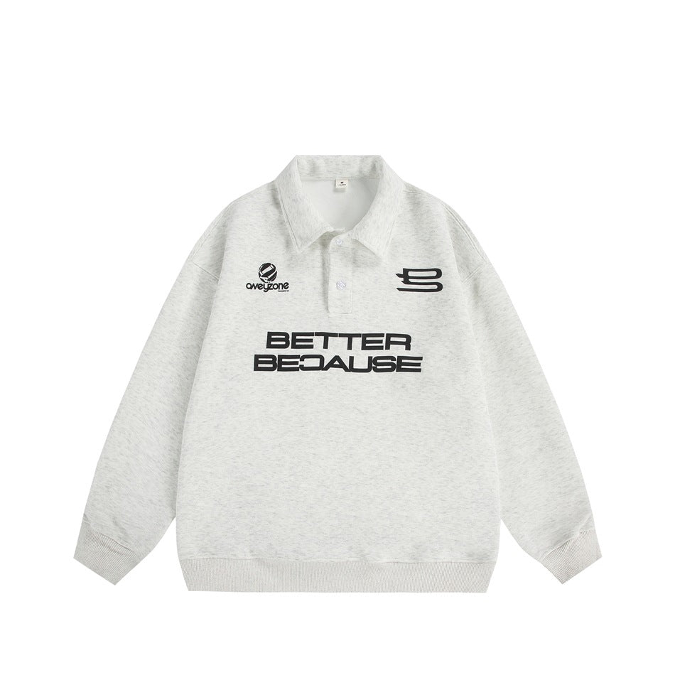 Light heathered gray polo-collar sweatshirt with black 'BETTER BECAUSE' print, logo graphics and ribbed cuffs, flat lay