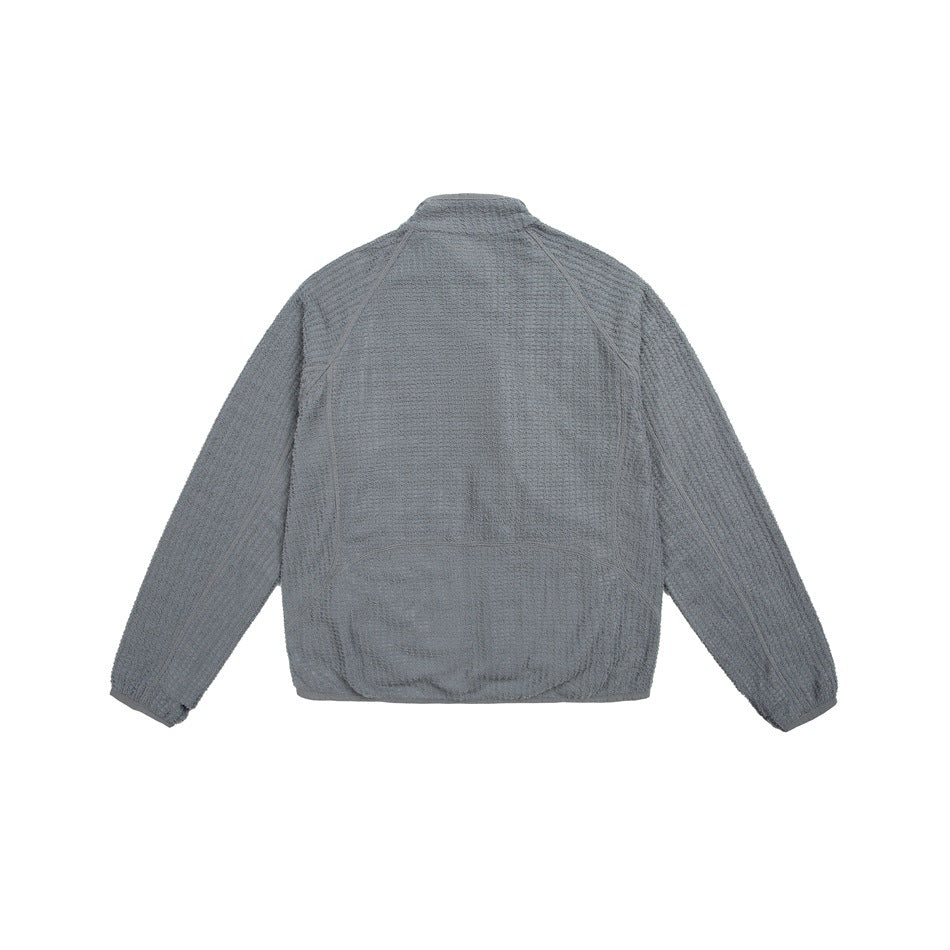 Back view of a gray long-sleeve zip jacket laid flat, with a stand collar and curved seam details.