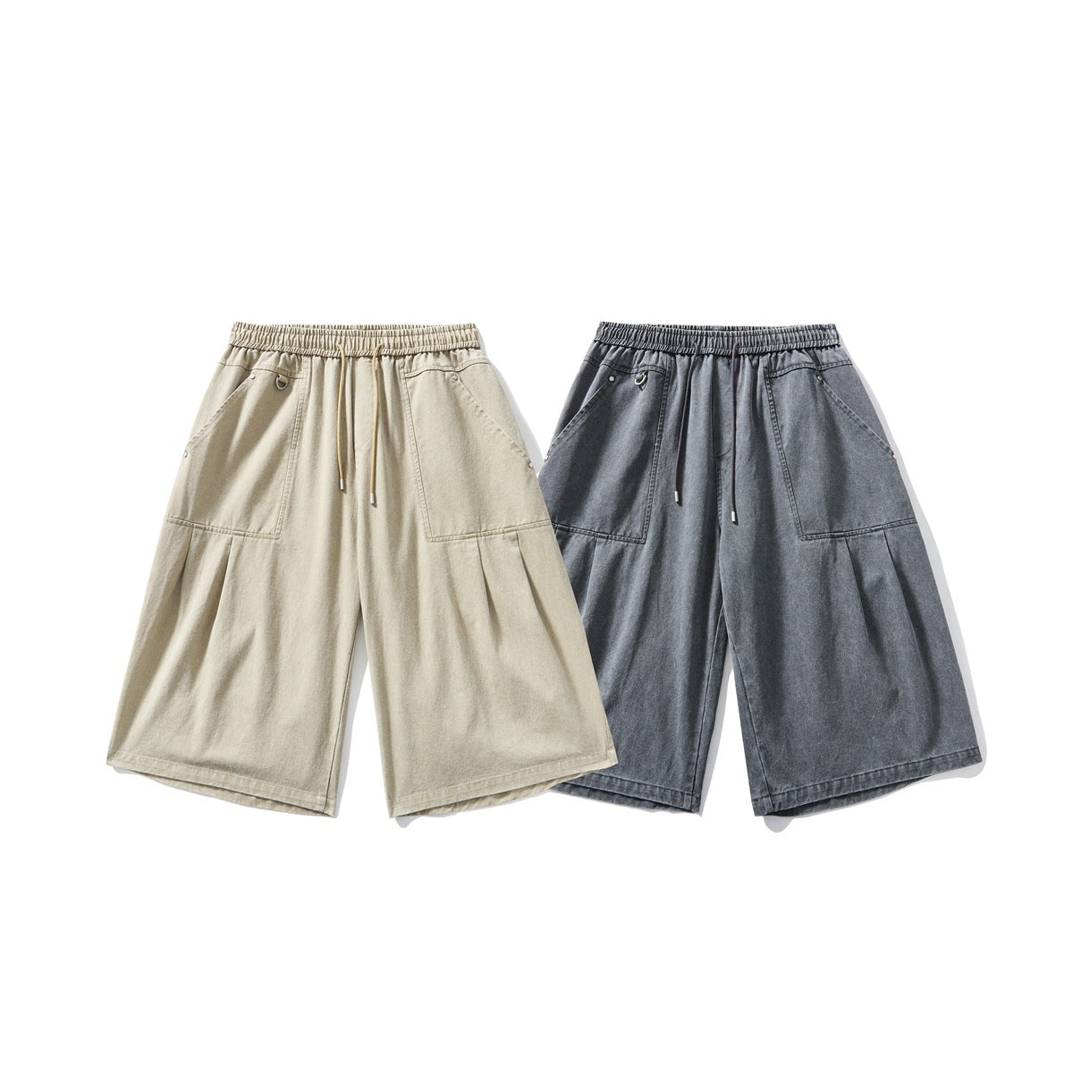 Front view of wide-leg elastic-waist shorts with drawstrings and large pockets in beige and washed charcoal gray.
