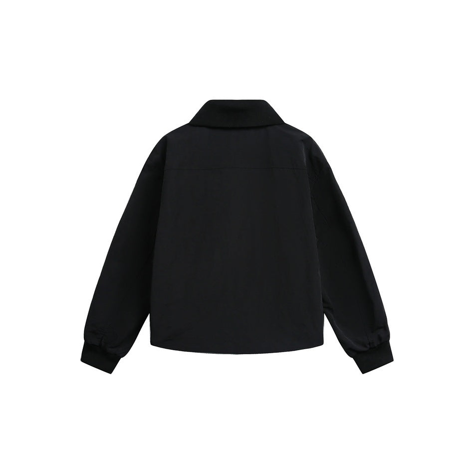 Back view of a black jacket with a wide collar, long sleeves, and ribbed cuffs, shown flat against a white background.