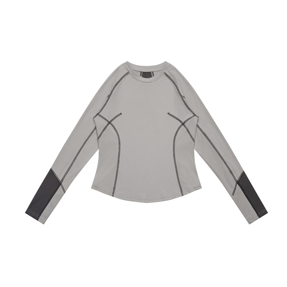 Gray long-sleeve crew-neck top flat lay with dark gray contrast stitching and dark gray lower-sleeve panels
