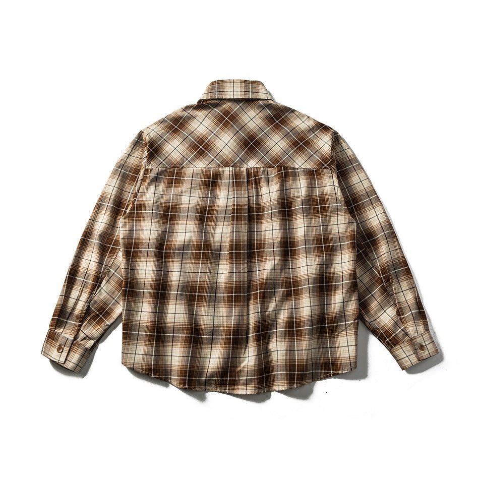 Back view of a brown, tan and cream plaid long-sleeve button-up shirt.