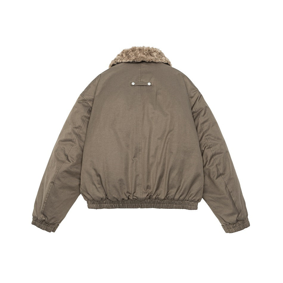 Back view of a taupe-brown jacket with a plush collar, gathered hem and cuffs, and a small snap tab.