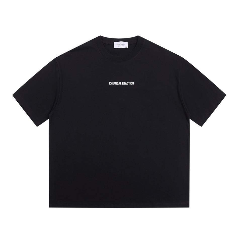 Black crew-neck short-sleeve T-shirt with small white CHEMICAL REACTION print at center chest, flat front view