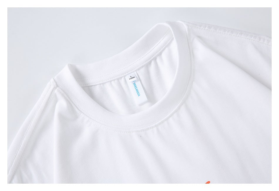 Close-up of a white T-shirt's crew neckline and shoulder seam, with a small sewn-in neck label.
