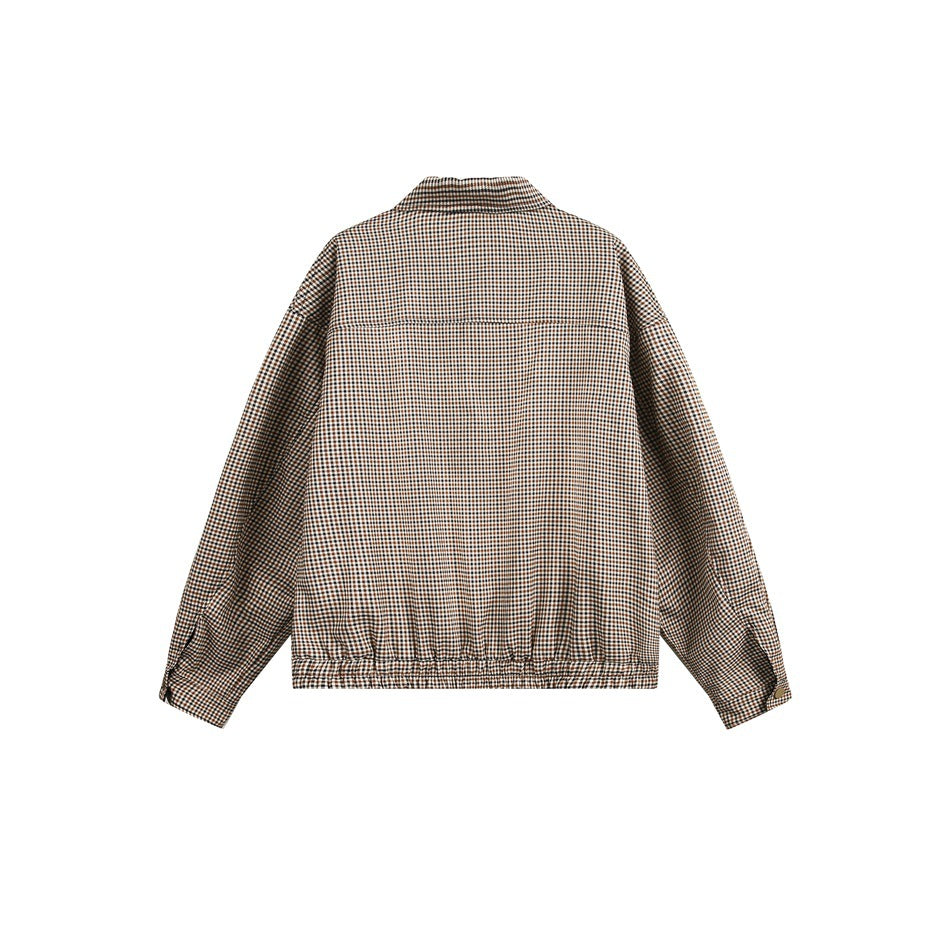 Back view of a brown, black, and cream micro-check jacket with long sleeves and an elastic hem.