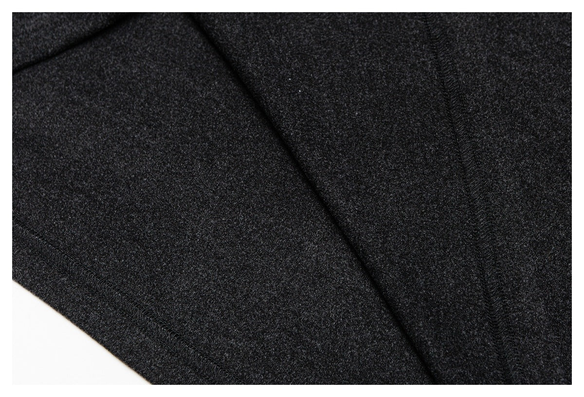 Close-up of dark charcoal fabric panels and finished seams.