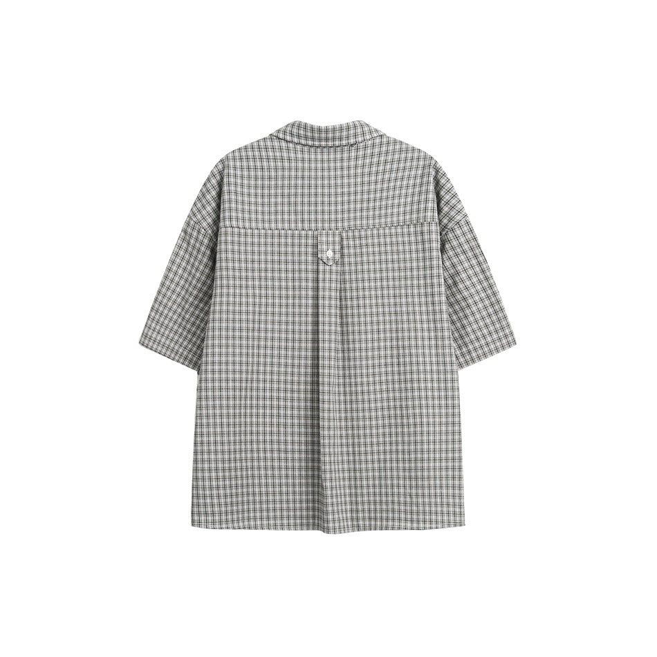 Back of a gray plaid short-sleeve button-up shirt, laid flat against a white background.