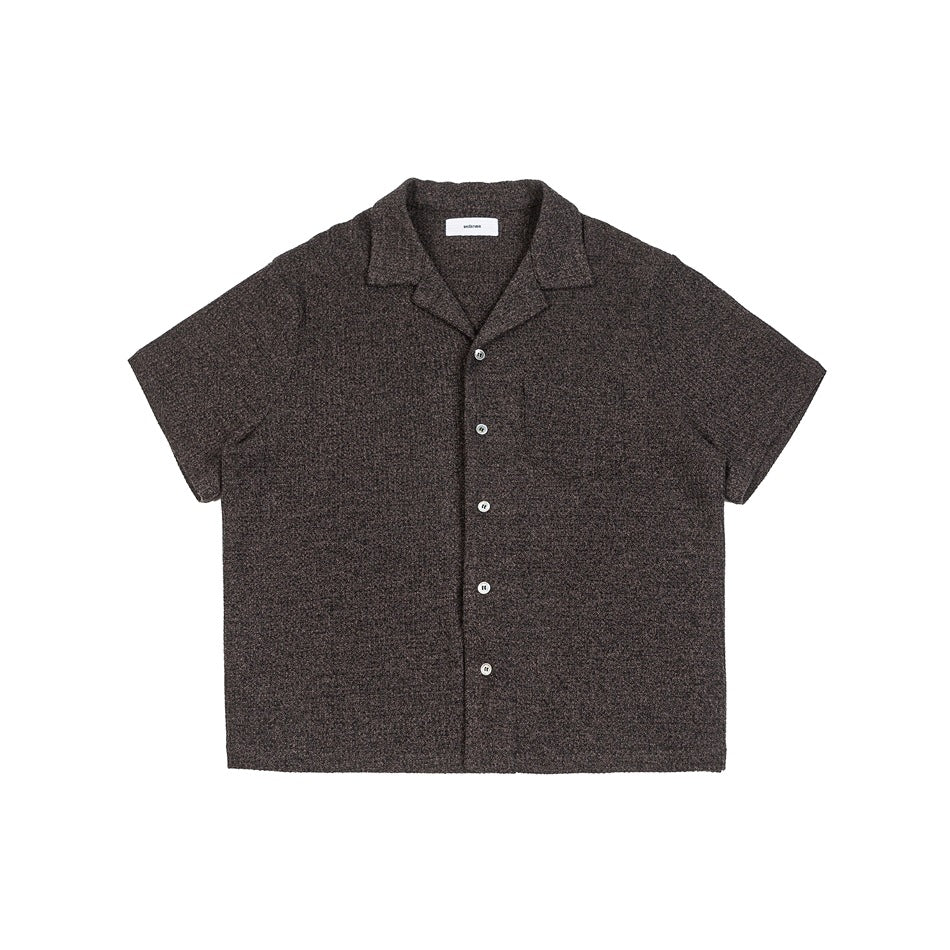 Dark heathered gray-brown short-sleeve camp collar shirt with pearly buttons and chest pocket, flat front view