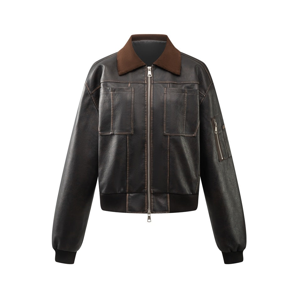 Dark brown cropped faux-leather bomber jacket with brown ribbed collar, front zipper, patch pockets and ribbed cuffs