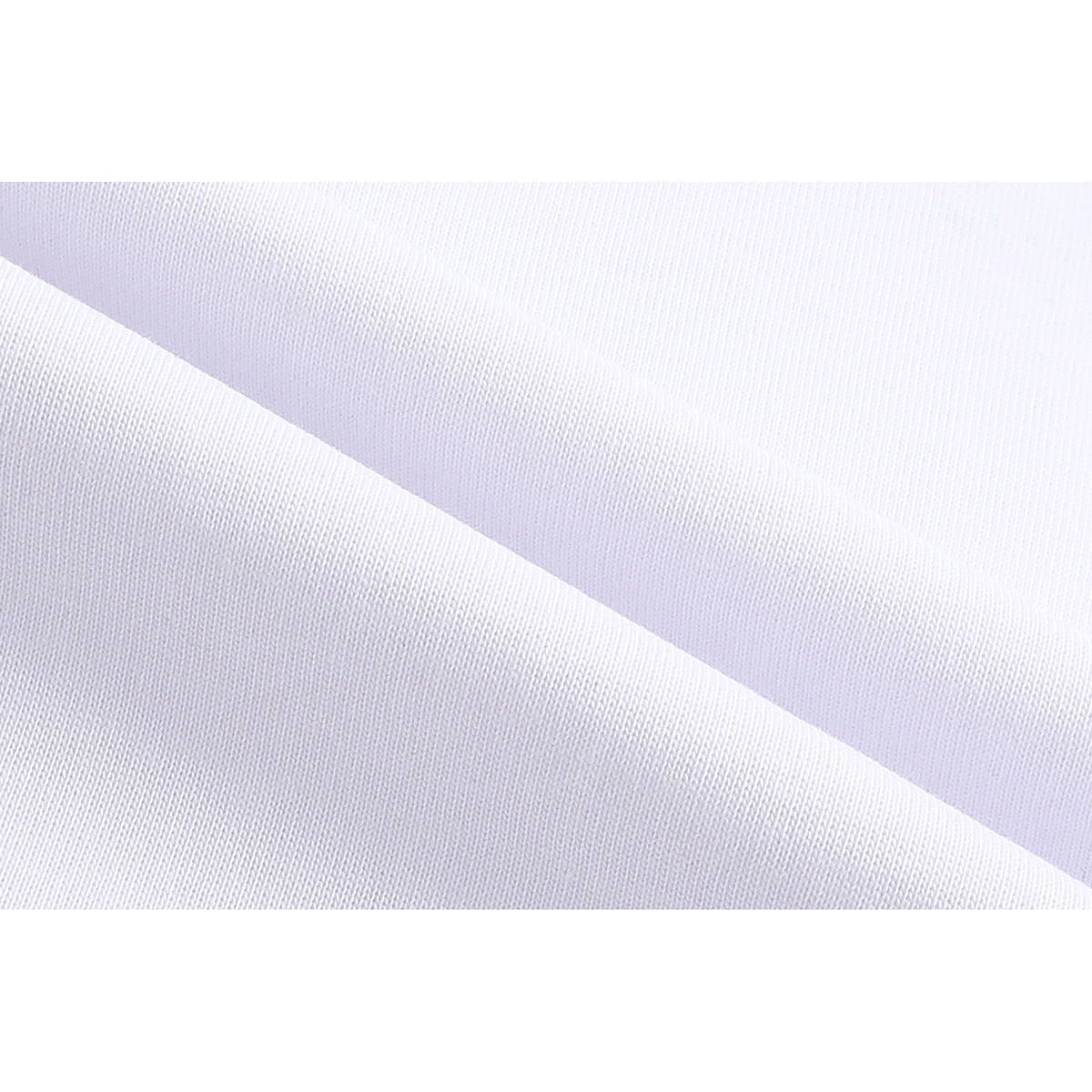 Extreme close-up of the white T-shirt fabric and a folded seam.