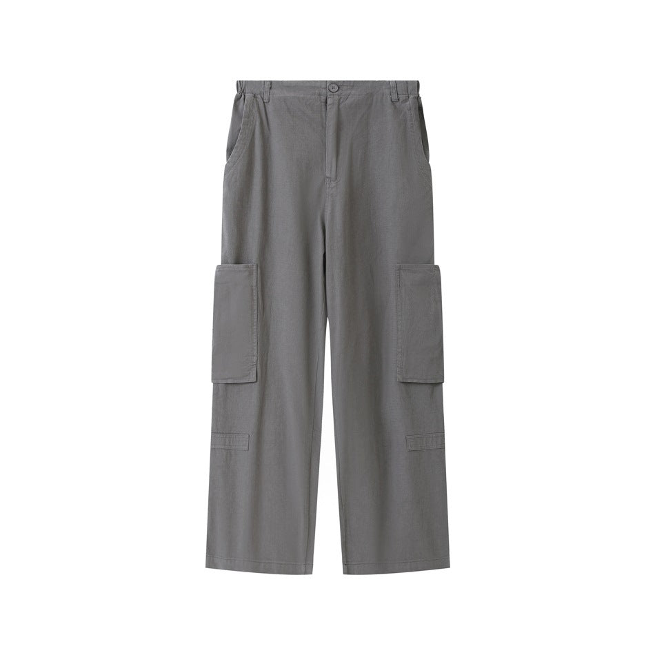 Dark gray wide-leg cargo pants flat lay, front view, with button waist and large thigh patch pockets