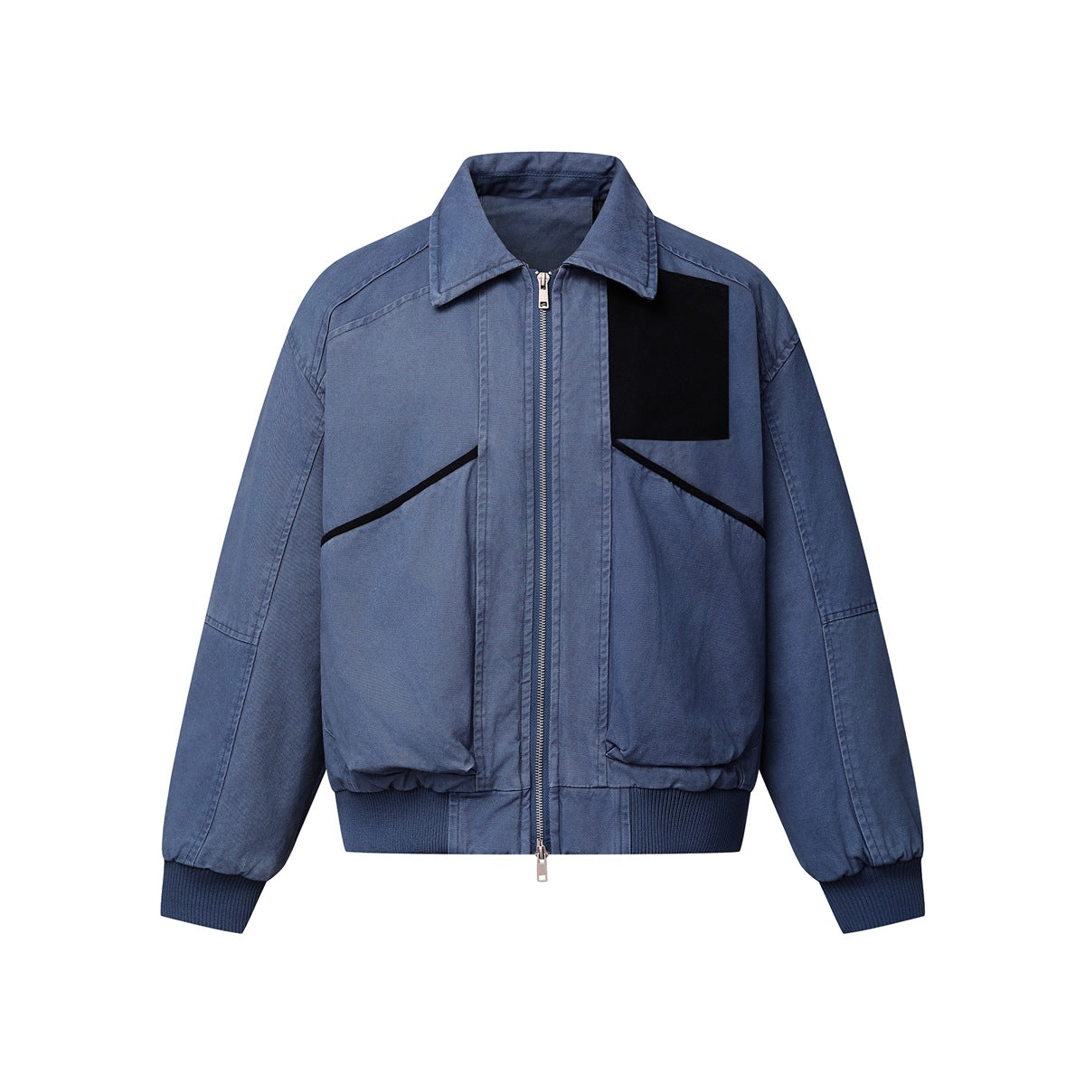Blue zip-front jacket with pointed collar, black chest patch, large front pockets and ribbed cuffs and hem, flat lay