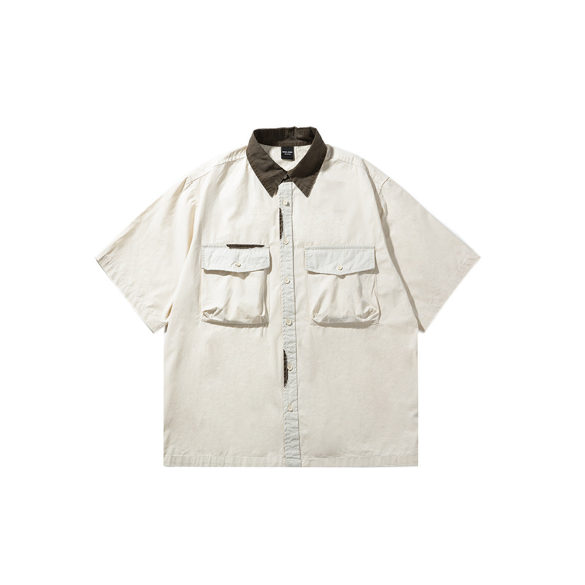 Beige short-sleeve button-up shirt with dark brown collar, pale placket and two button-flap chest pockets, front view